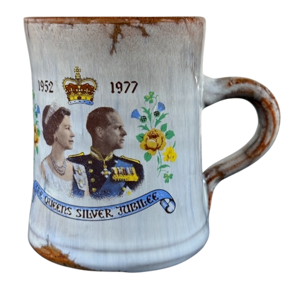 Queen's Silver Jubilee vintage 1977 pottery mug with royal couple portrait and floral design