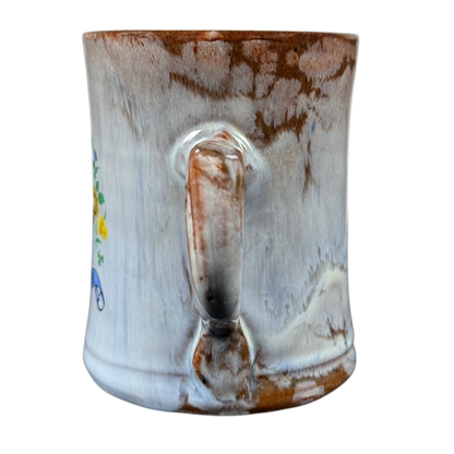 Queen's Silver Jubilee vintage 1977 pottery mug. Brown and white drip glazed ceramic mug with handle