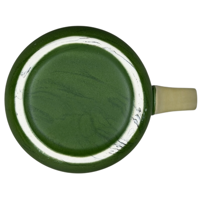 Top view of a Colorado fast food bear mug collectible in green with a unique marbled design