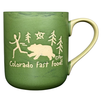 Green Colorado fast food bear mug collectible featuring a bear and running figure design