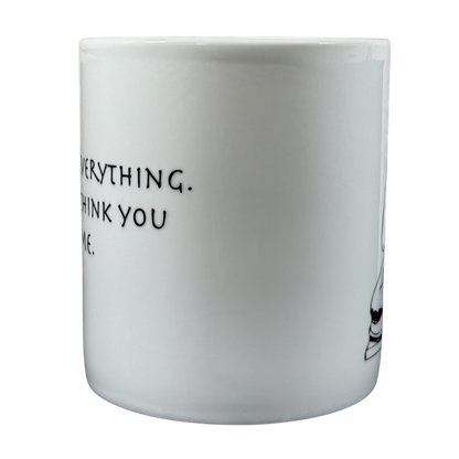 White Coventry Buddha collectible coffee mug with partial black text and Buddha illustration on side
