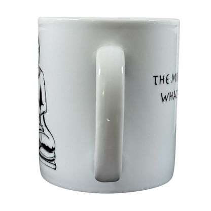 White Coventry Buddha collectible coffee mug with black Buddha illustration and partial text on side