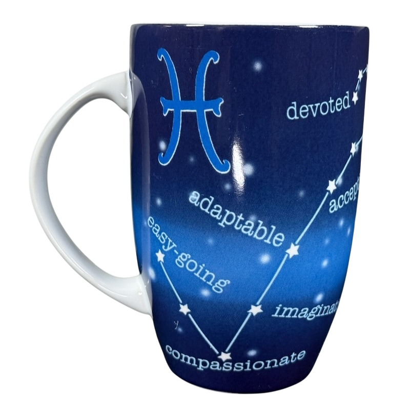 Coventry Pisces astrology collectible mug deep blue ceramic with white handle showing Pisces symbol constellation and trait words