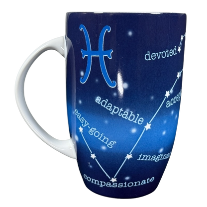 Coventry Pisces astrology collectible mug deep blue ceramic with white handle showing Pisces symbol constellation and trait words