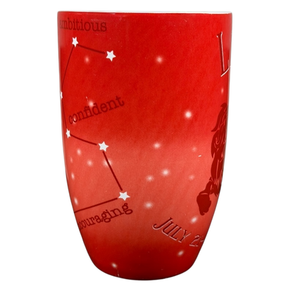 Leo zodiac astrology Coventry mug featuring constellation and personality traits on a vibrant red background