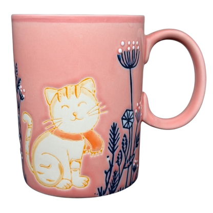 Cute Pink Cat Orange Scarf Ember Glow Mug with floral design and cheerful cat illustration