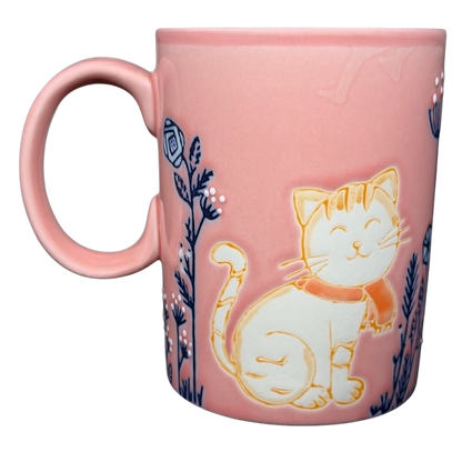 Cute Pink Cat Orange Scarf Ember Glow Mug featuring a smiling cat design with floral accents