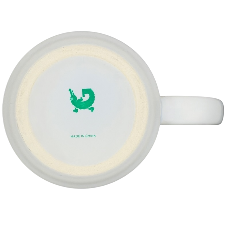 Bottom view of the Dave Whitlock Trout and Dragonfly Fly Fishing Mug with green logo detail