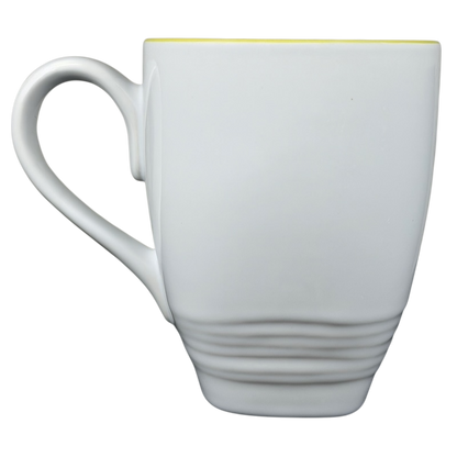 Dean Crouser Dragonfly Mug with a sleek white design and subtle textured details