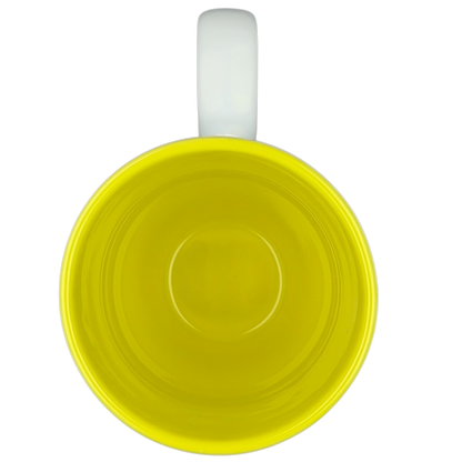 Top view of the Dean Crouser Dragonfly Mug featuring a vibrant yellow interior for coffee or tea lovers
