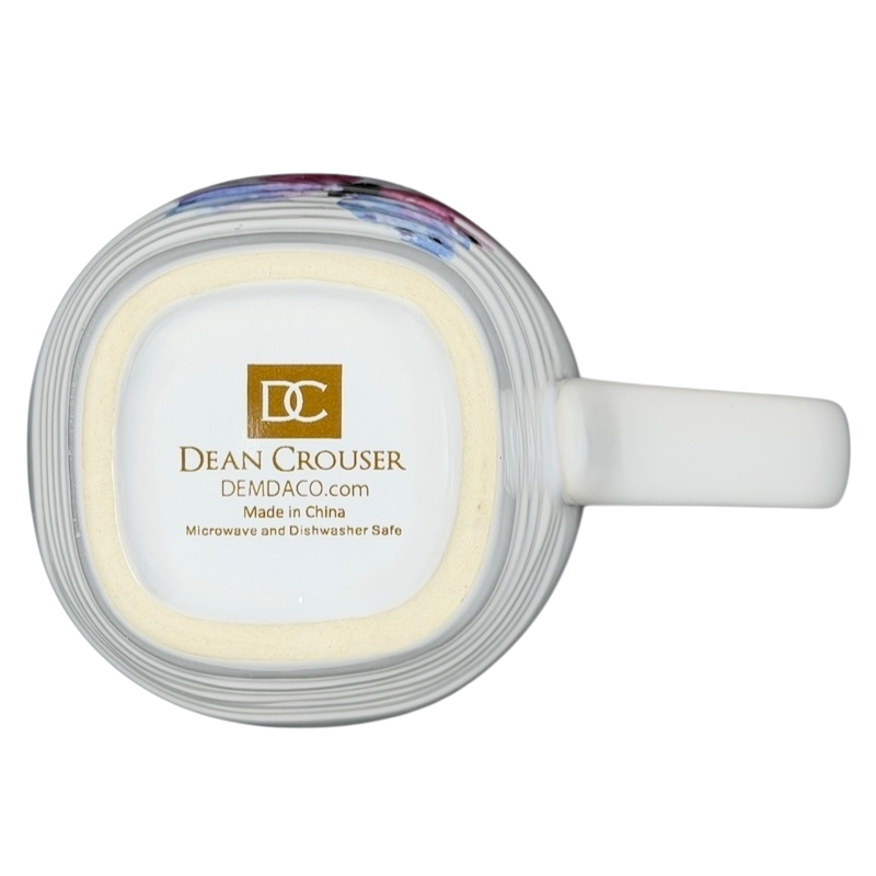 Bottom view of Dean Crouser watercolor butterflies collectible mug showcasing brand details and safe usage