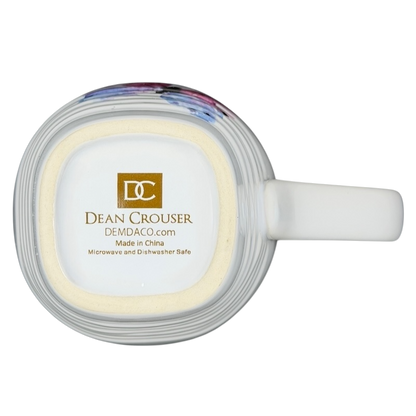 Bottom view of Dean Crouser watercolor butterflies collectible mug showcasing brand details and safe usage