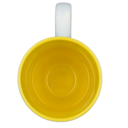 Top view of Dean Crouser watercolor butterflies collectible mug with a vibrant yellow interior