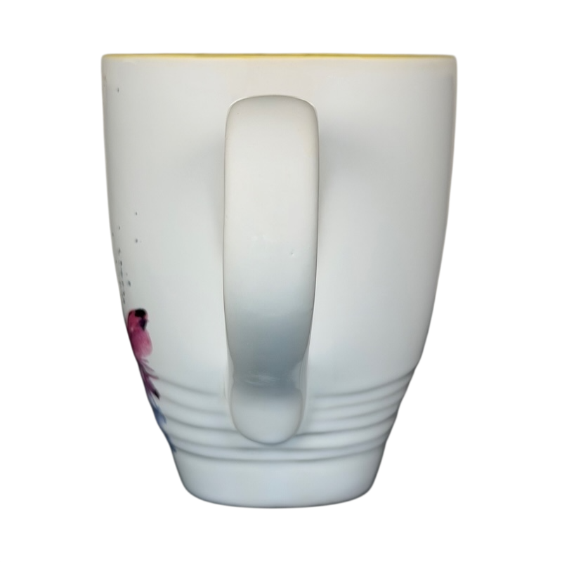 Side view of Dean Crouser watercolor butterflies collectible mug with vibrant floral design