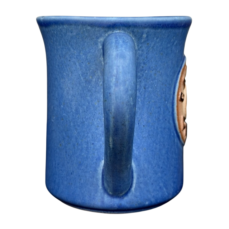 Blue ceramic Deer Logo Mug Caribou Coffee featuring a sturdy handle for everyday use