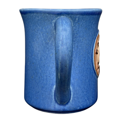 Blue ceramic Deer Logo Mug Caribou Coffee featuring a sturdy handle for everyday use