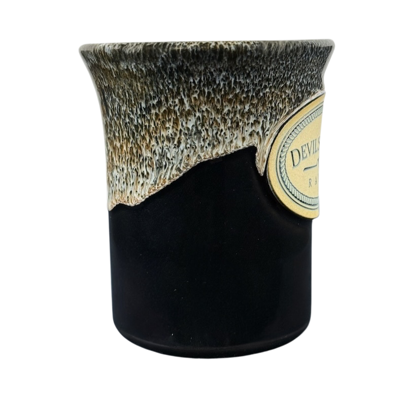 Deneen Pottery Devil's Thumb Ranch mug 2017 black ceramic mug with cream textured drip glaze and label