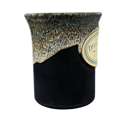 Deneen Pottery Devil's Thumb Ranch mug 2017 black ceramic mug with cream textured drip glaze and label