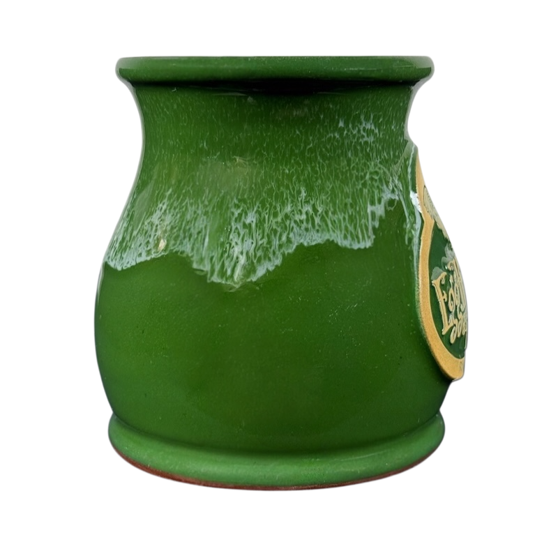 Green dripped glaze ceramic mug with flared rim and side badge Deneen Pottery Egg Harbor Rockford Illinois vintage mug