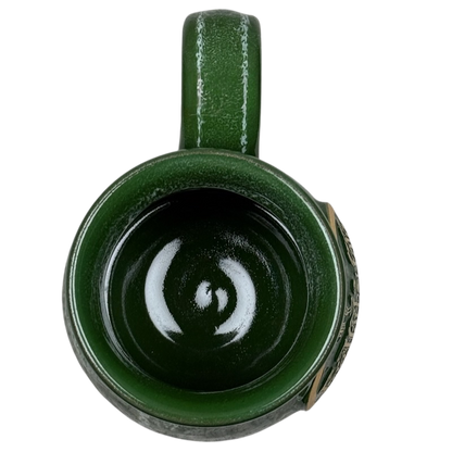 Top view of green glazed Deneen Pottery Egg Harbor Rockford Illinois vintage mug with handle and glossy interior