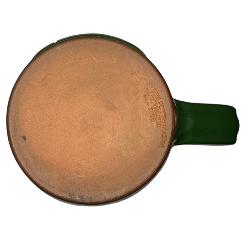 Deneen Pottery Egg Harbor Rockford Illinois vintage mug bottom with unglazed terracotta base and maker stamp on green mug