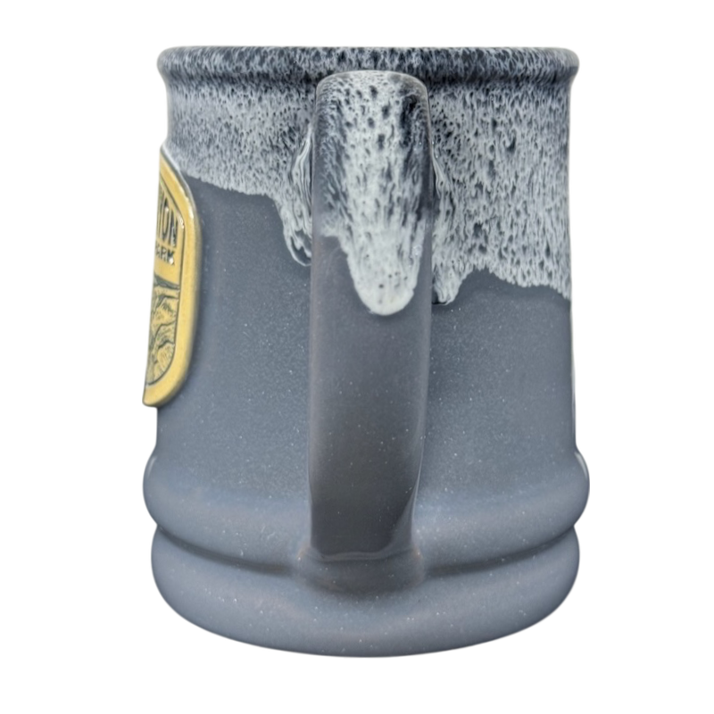 Grand Canyon National Park Deneen Pottery collectible mug blue gray ceramic with white drip glaze and handle view