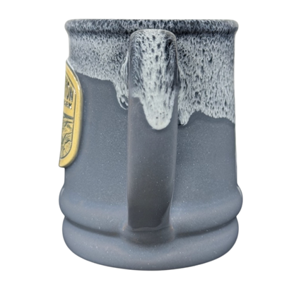 Grand Canyon National Park Deneen Pottery collectible mug blue gray ceramic with white drip glaze and handle view