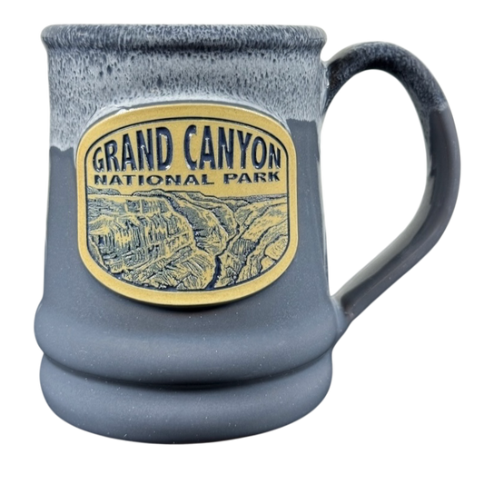 Gray blue Deneen Pottery mug with raised Grand Canyon plaque, handle, Grand Canyon National Park Deneen Pottery collectible mug.
