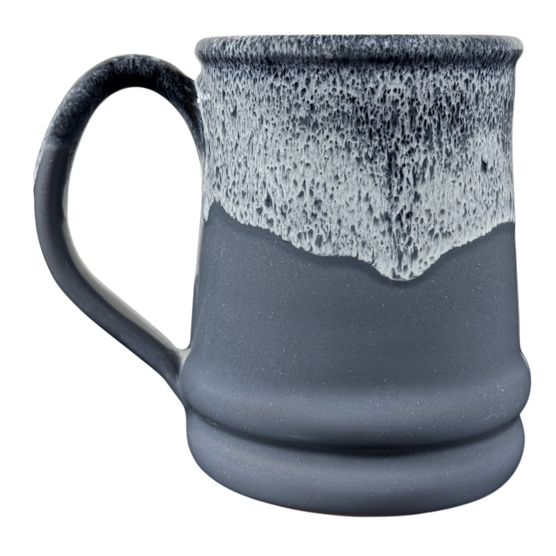 Handcrafted charcoal mug with white drip glaze and rounded base, Grand Canyon National Park Deneen Pottery collectible mug.