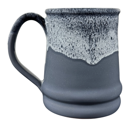 Handcrafted charcoal mug with white drip glaze and rounded base, Grand Canyon National Park Deneen Pottery collectible mug.