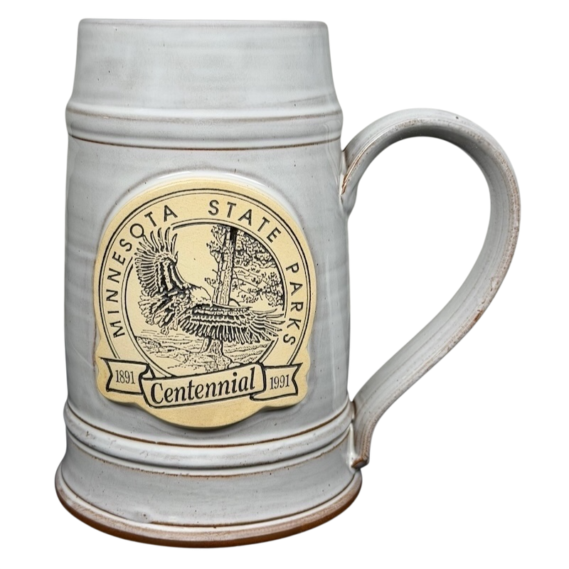 Minnesota State Parks Centennial Stein Deneen Pottery with intricate design and sturdy handle
