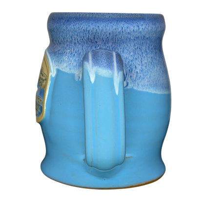 Mount Rainier National Park Mug Deneen Pottery in blue with textured handle and scenic design
