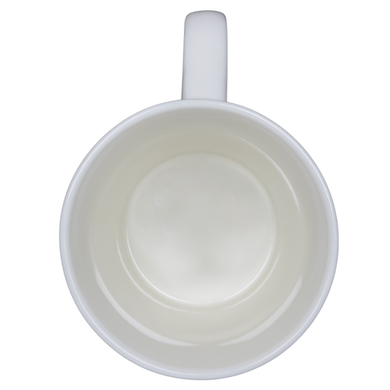 Inside view of the Diamond Dog Rory Dobner Monogram Mug Williams Sonoma showing a smooth, white ceramic finish