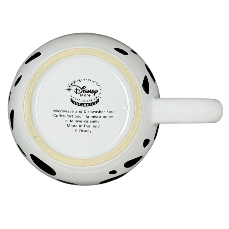 Bottom view of Disney Store 101 Dalmatians embossed vintage mug with black spots and care instructions