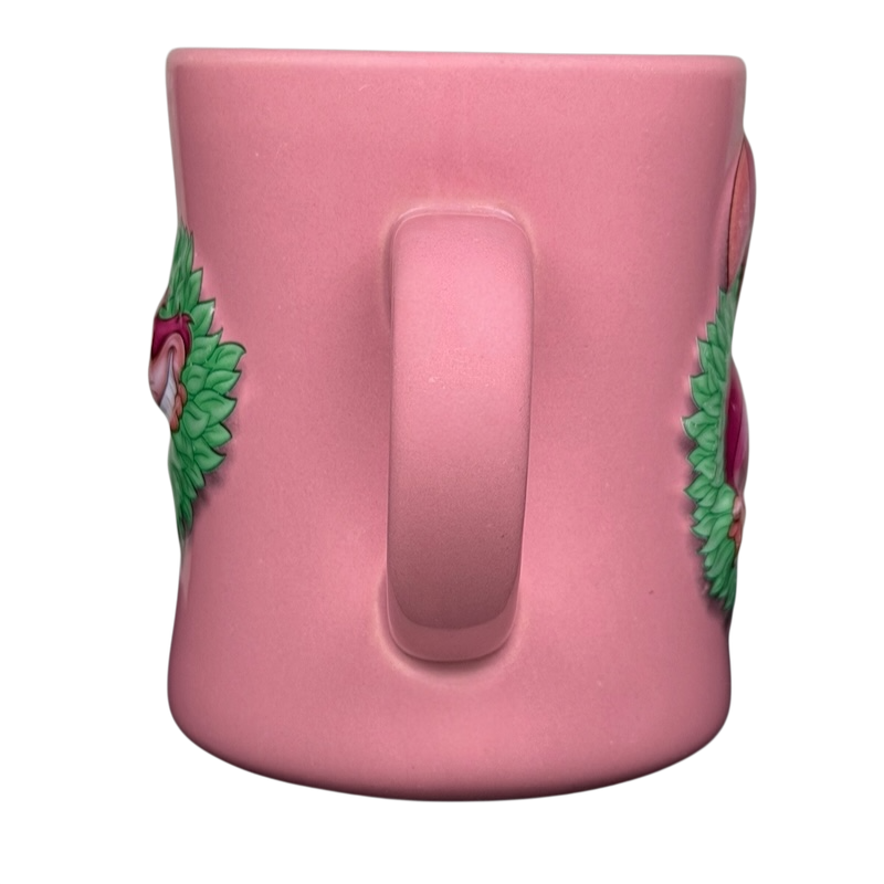 Alice In Wonderland Cheshire Cat Mug Disney in pink with colorful floral designs on the sides