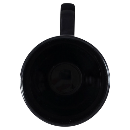 Top view of a black Disney Alice Through The Looking Glass collectible mug with a handle