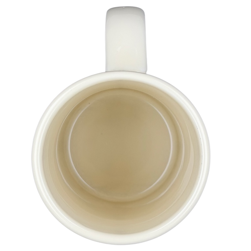 Inside view of Disney California Adventure Mickey Mouse mug showcasing a smooth, cream-colored finish