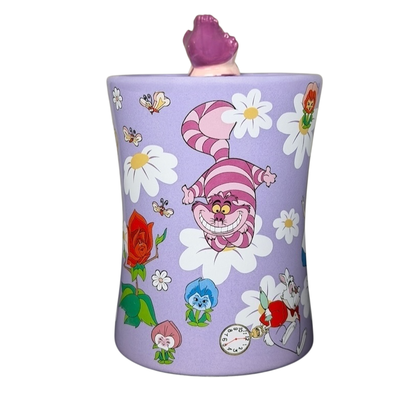 Disney Cheshire Cat collectible mug featuring colorful floral designs and cheerful character illustrations