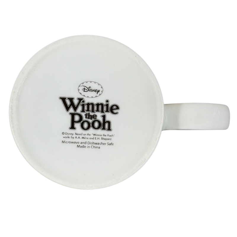 Bottom view of Disney collectible mug Eeyore Piglet with Winnie the Pooh logo and microwave safe label