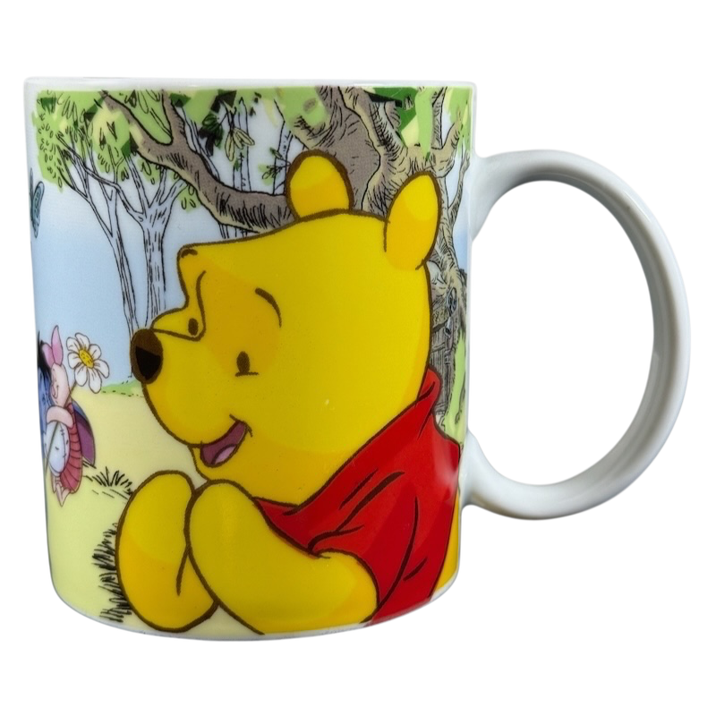Disney collectible mug Eeyore Piglet featuring Winnie the Pooh and Piglet in a forest scene