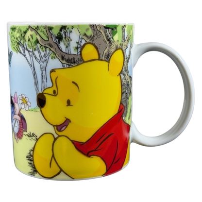 Disney collectible mug Eeyore Piglet featuring Winnie the Pooh and Piglet in a forest scene