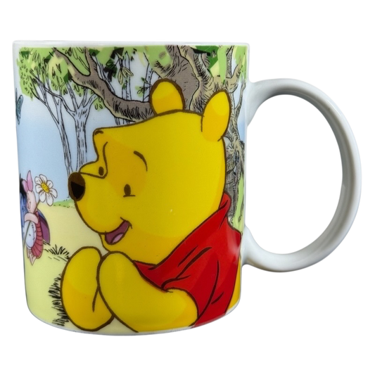 Disney collectible mug Eeyore Piglet featuring Winnie the Pooh and Piglet in a forest scene