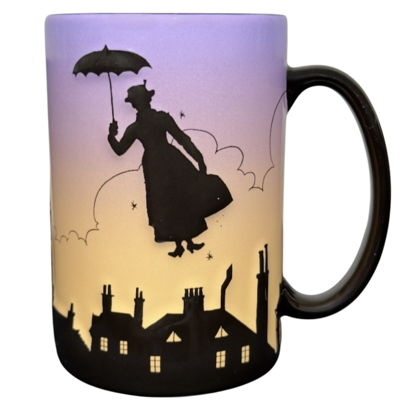 Disney Parks Mary Poppins silhouette vintage mug showing black flying Mary Poppins over rooftops on gradient sky