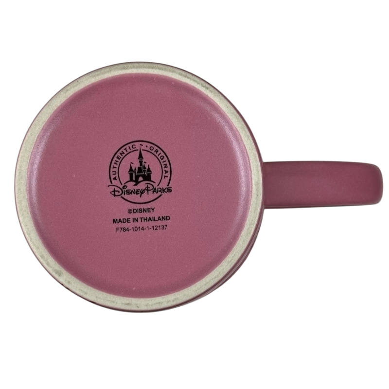 Bottom view of pink ceramic Disney Parks Minnie Mouse vintage mug showing Authentic Parks stamp and handle