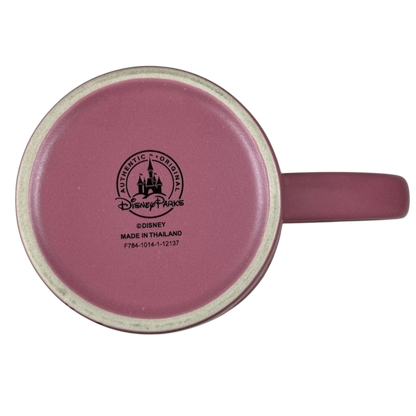 Bottom view of pink ceramic Disney Parks Minnie Mouse vintage mug showing Authentic Parks stamp and handle