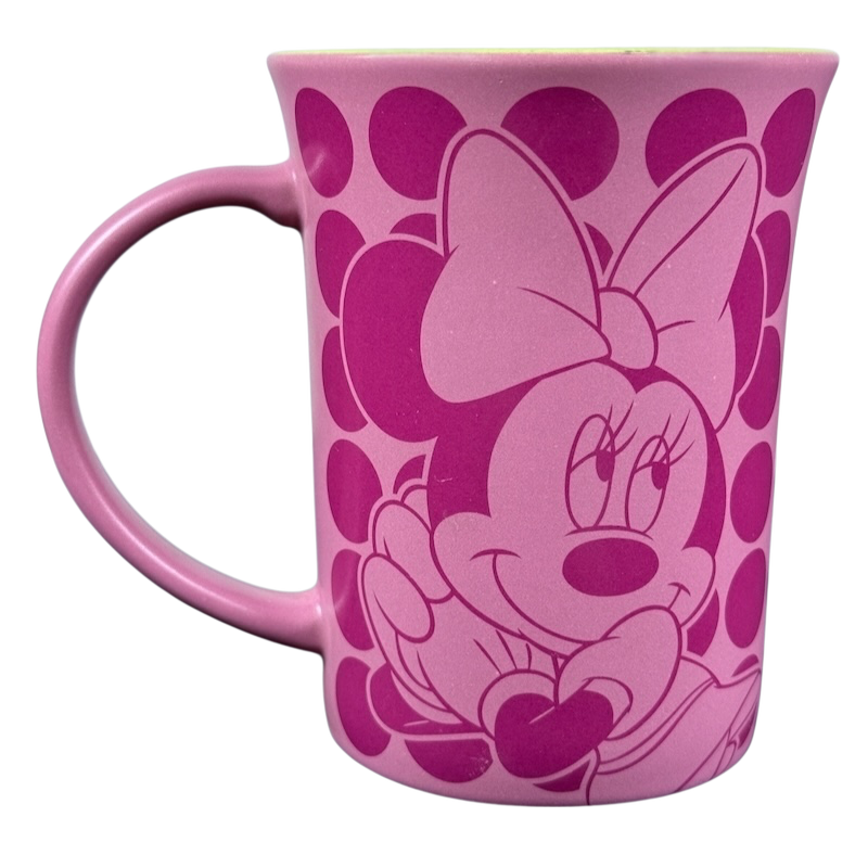 Disney Parks Minnie Mouse vintage mug pink ceramic with large Minnie face bow and polka dot background