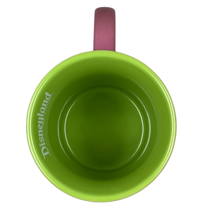 Disney Parks Minnie Mouse vintage mug top view showing green interior pink handle and white Disneyland logo