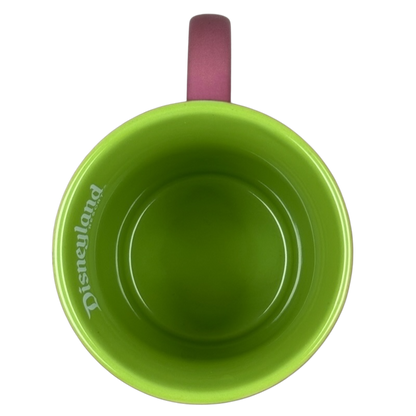 Disney Parks Minnie Mouse vintage mug top view showing green interior pink handle and white Disneyland logo