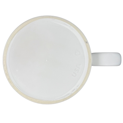 Bottom view of a white Donald Duck morning mood jumbo mug showcasing its smooth surface