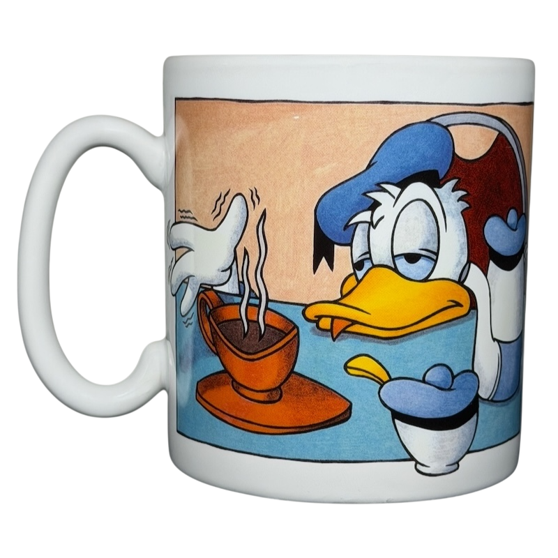 Donald Duck morning mood jumbo mug featuring a sleepy Donald with coffee and a sugar bowl